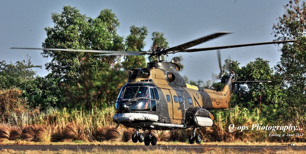 IMAGE: http://i779.photobucket.com/albums/yy77/Q_ops/Aircraft%20in%20HDR/PUMAHDR-001_zpse3fe6afc.jpg